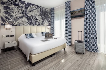 Standard Room, Multiple Beds, Balcony, Garden View