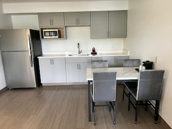Suite, 2 Queen Beds, Accessible, Kitchenette (with Sofabed)