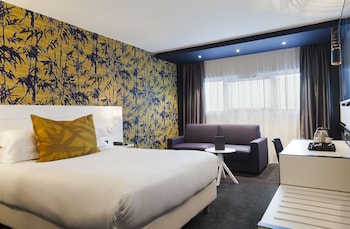 with a double bed and a sofa bed