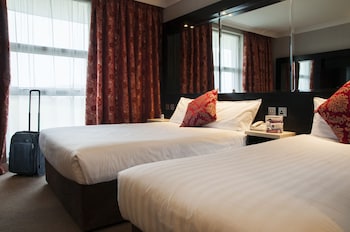 Triple Room – One Double and One Single Bed