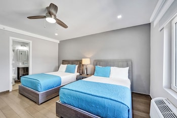 Partial Ocean View Room with Two Double Beds