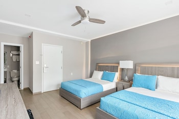 Partial Ocean View Room with Two Double Beds