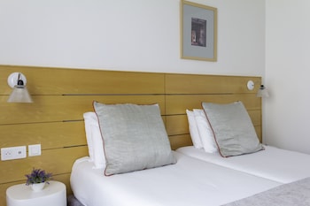 Superior Twin Room - Complimentary soft minibar,courtesy tray, Chromecast and digital press