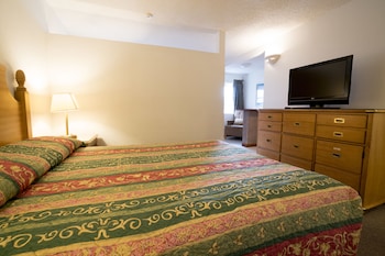 One Queen Bed with 7 Days Parking