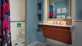 Standard View. Wheelchair accessible with roll-in shower and option for hearing accessibility. 2 que