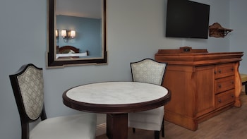 King Bed. Wheelchair accessible with roll-in shower and option for hearing accessibility. 1 king bed