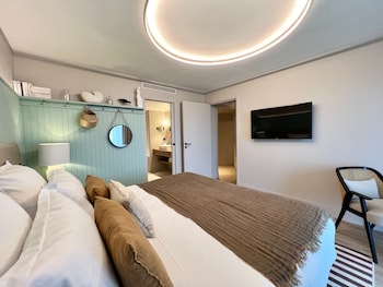 Garden level Junior Suite with terrace - Sea side