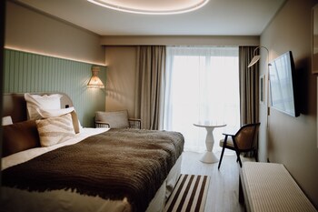 Garden level Classic Room with terrace - partial sea view
