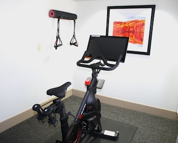 1 Queen Bed with Peloton Exercise Bicycle