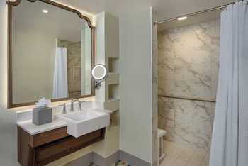 King Bed. Wheelchair accessible with roll-in shower and option for hearing accessibility. 1 king bed