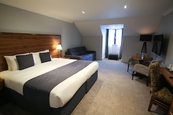 Deluxe room with 1 double or twin bed and 1 sofa bed
