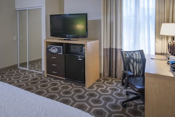 Two queens beds with accessible tub