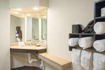 Two queens beds with accessible tub