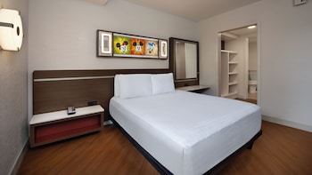 Family Suite. Wheelchair accessible with tub and option for hearing accessibility.  1 queen bed, 2 q
