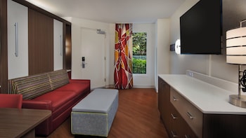 Family Suite. Wheelchair accessible with tub and option for hearing accessibility.  1 queen bed, 2 q