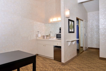 Suite, 1 Queen Bed, Refrigerator & Microwave, Courtyard Area (Living Room)