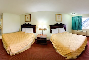 Room with Two Double Beds with Sofa Bed