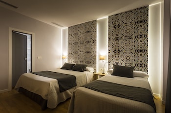 Triple Room (Two twin and one extra bed)