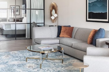Deluxe City View Suite, 1 King Bed with Sofa Bed, Separate Living/Ding Area, Shower only