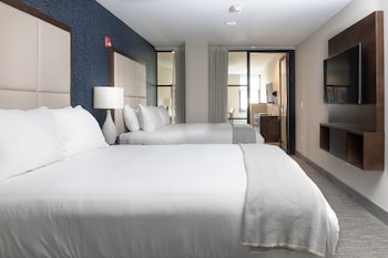 Deluxe Suite, 2 Queen Beds, City View (Separate Living/Dining, Shower only)