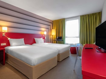 Standard Room with 2 single beds and 1 sofa
