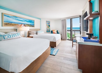 Premium Sand Room Two Queen Beds Partial Ocean View
