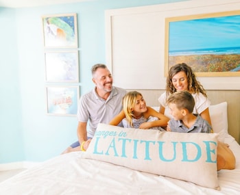 Premium Sand Room Two Queen Beds Partial Ocean View