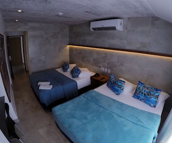 Quarto família 4, vista frente oceano