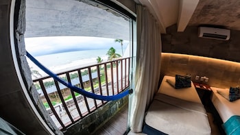 Quarto família 3, vista frente oceano