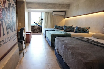 Quarto família 6, vista frente oceano