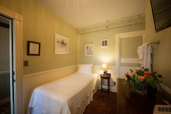 Room (One twin bed-private hall bath)