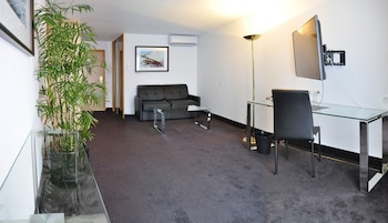 Suite STANDING grand lit et canapé-lit pour enfant de 12 ans maximum