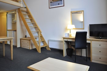 Suite AFFAIRES grand lit et canapé-lit pour enfant de 12 ans maximum