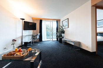 Suite STANDING grand lit et canapé-lit pour enfant de 12 ans maximum
