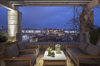 Premium Executive Suite with a terrace and Old City view.